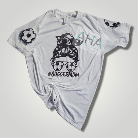 Messy Bun Soccer Mom white tee with soccer ball sleeves